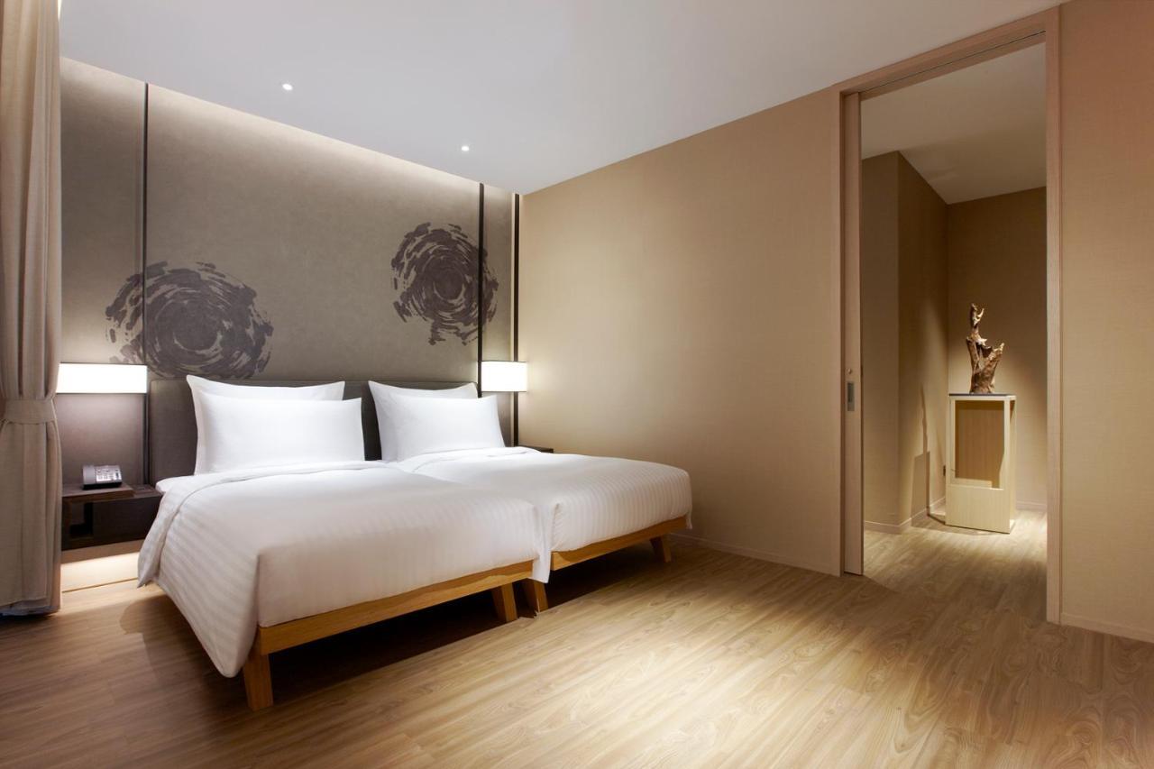 Mu Jiaoxi Hotel Exterior photo Deluxe Room