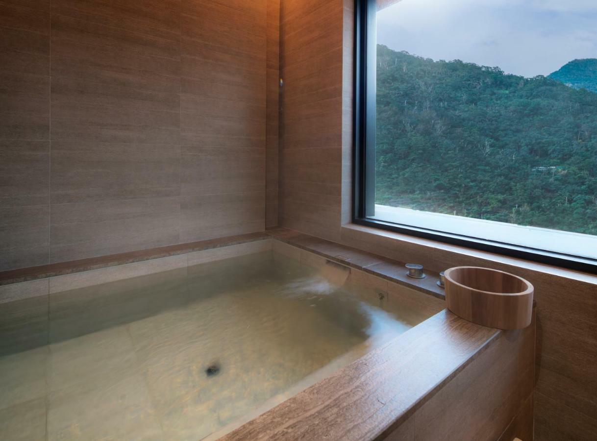 Mu Jiaoxi Hotel Exterior photo A modern Japanese bathtub