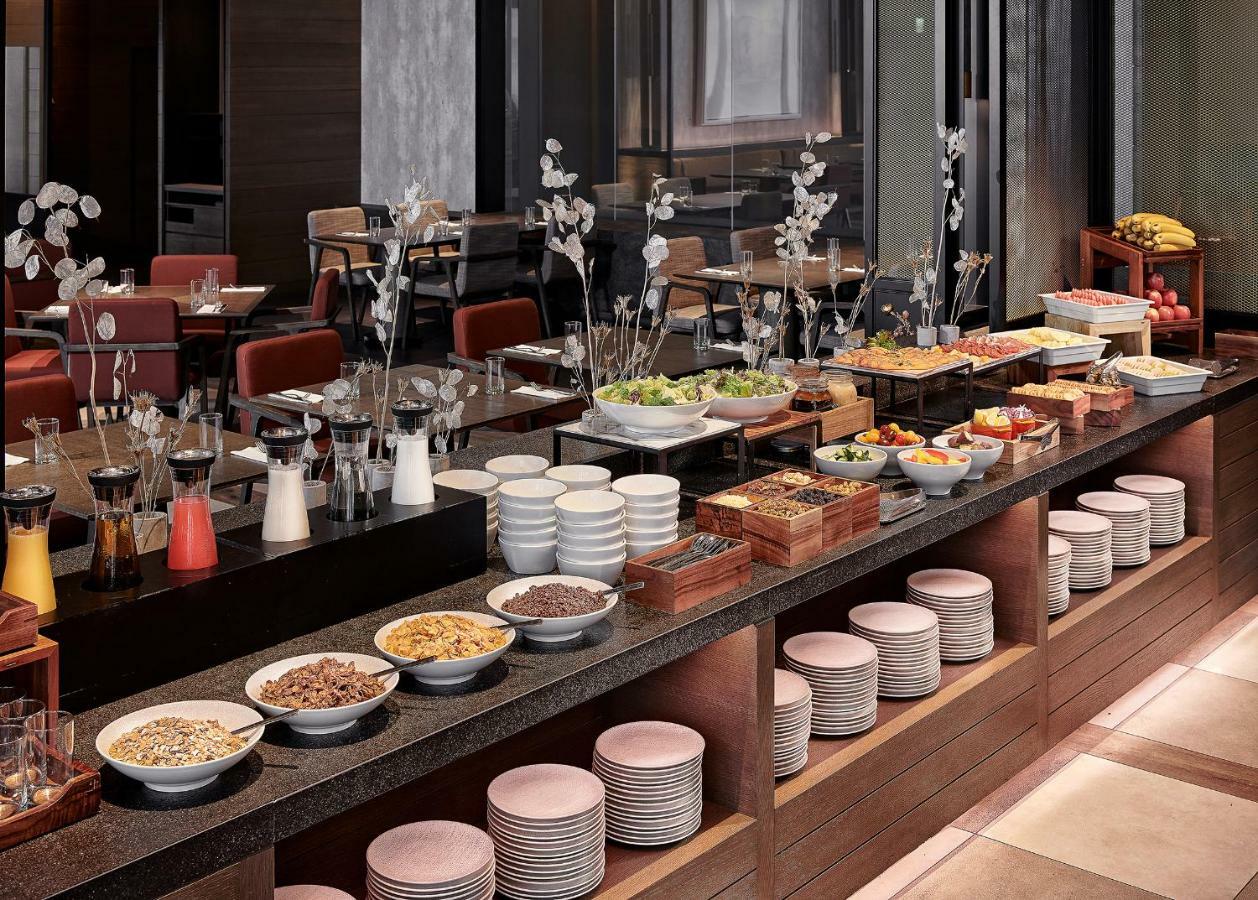 Mu Jiaoxi Hotel Exterior photo A buffet at a hotel